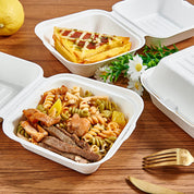 ECOLipak disposable food containers filled with delicious meals like pasta with meat and a savory - topped pastry.