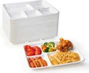 A stack of white ecolipak compartment trays beside a filled tray with tomatoes, vegetables, pasta, chicken, and sliced meats in separate sections.