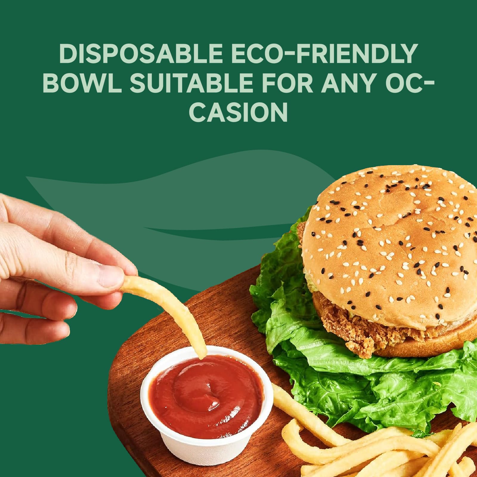A hand dips a French fry into a ketchup cup beside a sesame seed chicken burger on a wooden platter, showcasing eco-friendly dining.