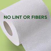 A roll of ECOLipak toilet paper with the text “NO LINT OR FIBERS” displayed, showcasing its lint - free quality.