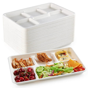 A stack of Ecolipak white compartment trays alongside a filled tray showcasing a variety of foods.